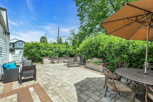 28 Bradford Rd, Plainview, NY 11803 - view of patio featuring outdoor dining space