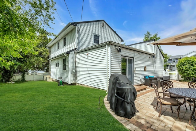 28 Bradford Rd, Plainview, NY 11803 - back of house featuring a patio and outdoor dining space
