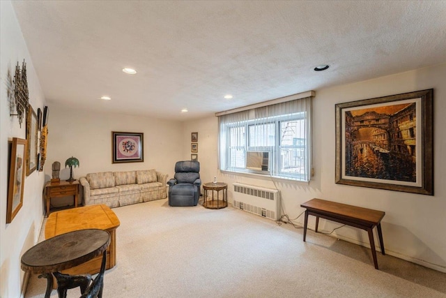 31-90 140th St Unit 3K, Flushing, NY 11354 - living room featuring radiator heating unit, carpet floors, recessed lighting, and baseboards