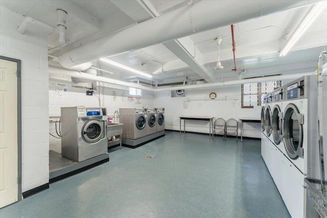 31-90 140th St Unit 3K, Flushing, NY 11354 - shared laundry with separate washer and dryer and concrete block wall