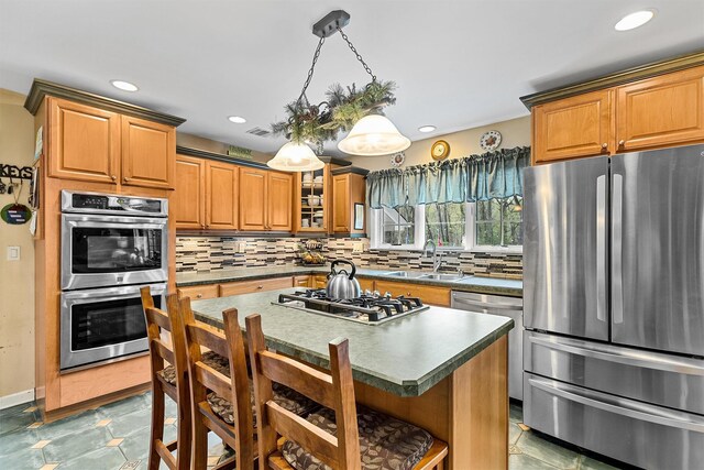 21 Mile Rd, Suffern, NY 10901 - kitchen featuring stainless steel appliances, a sink, decorative backsplash, recessed lighting, and a center island