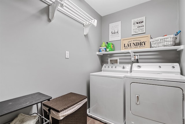 21 Mile Rd, Suffern, NY 10901 - laundry room featuring washing machine and clothes dryer and wood finished floors