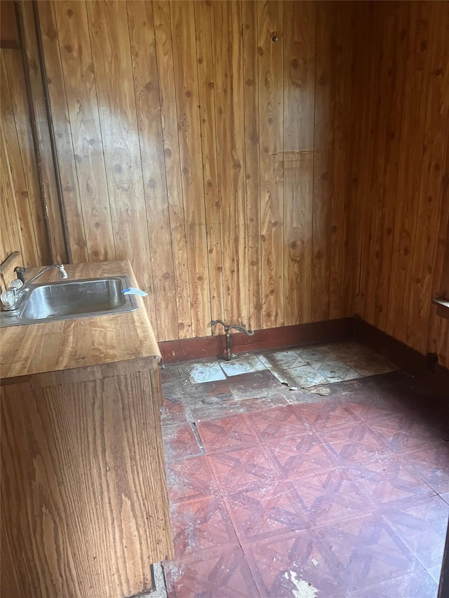 95 W Van Ness St, Newburgh, NY 12550 - empty room with a sink and wood walls