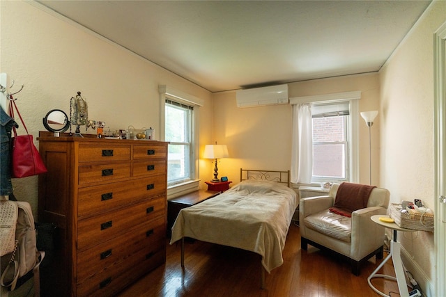 42-32 204th St, Bayside, NY 11361 - bedroom with a wall mounted AC and wood-type flooring