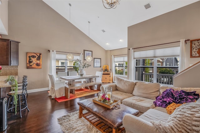 135 Rosebud Ct Unit 135, Patchogue, NY 11772 - living room featuring high vaulted ceiling, dark wood-type flooring, baseboards, a chandelier, and recessed lighting