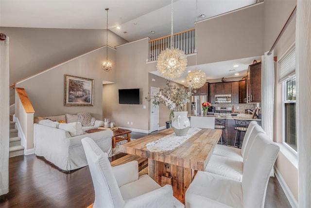 135 Rosebud Ct Unit 135, Patchogue, NY 11772 - living room featuring high vaulted ceiling, dark wood-style flooring, stairs, baseboards, and recessed lighting