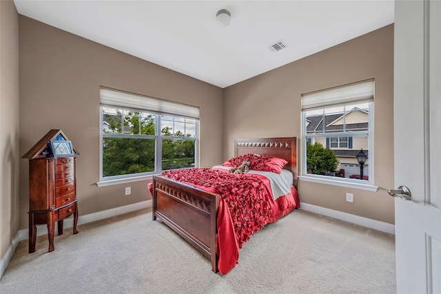 135 Rosebud Ct Unit 135, Patchogue, NY 11772 - carpeted bedroom with baseboards