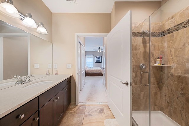135 Rosebud Ct Unit 135, Patchogue, NY 11772 - full bathroom with vanity, connected bathroom, a shower stall, and ceiling fan