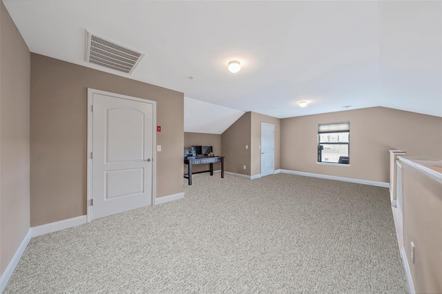 135 Rosebud Ct Unit 135, Patchogue, NY 11772 - additional living space featuring carpet, vaulted ceiling, baseboards, and an office area