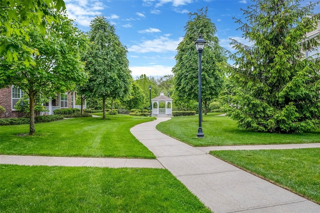 135 Rosebud Ct Unit 135, Patchogue, NY 11772 - view of property's community featuring a yard and a gazebo
