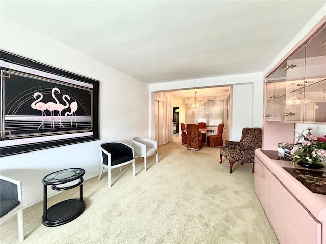 26-20 141st St Unit 1E, Flushing, NY 11354 - sitting room featuring light carpet and a chandelier