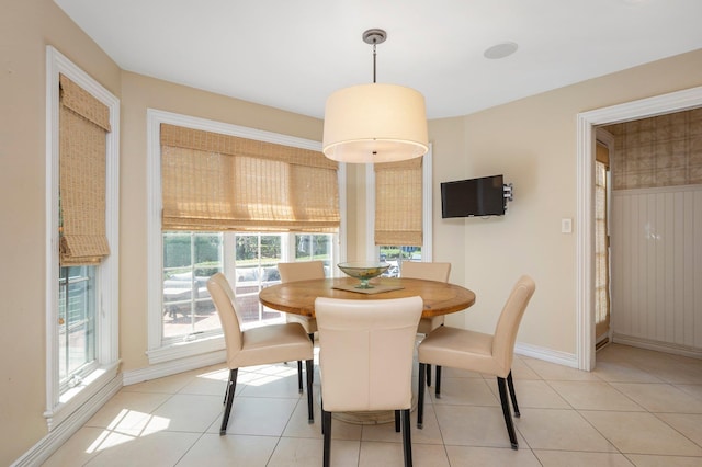 82 Woods Dr, East Hills, NY 11576 - dining area featuring baseboards and light tile patterned flooring