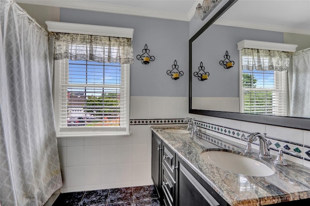 100 Fairfax Rd, Massapequa, NY 11758 - bathroom featuring double vanity, tile walls, ornamental molding, and tile patterned floors