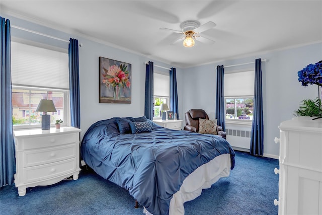 100 Fairfax Rd, Massapequa, NY 11758 - bedroom with dark colored carpet, radiator, multiple windows, ceiling fan, and ornamental molding