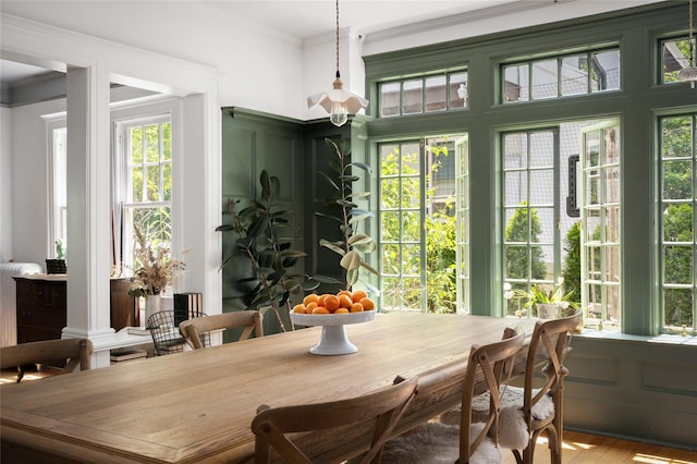305 Park Hill Ave, Yonkers, NY 10705 - dining area with plenty of natural light, ornamental molding, and wood finished floors