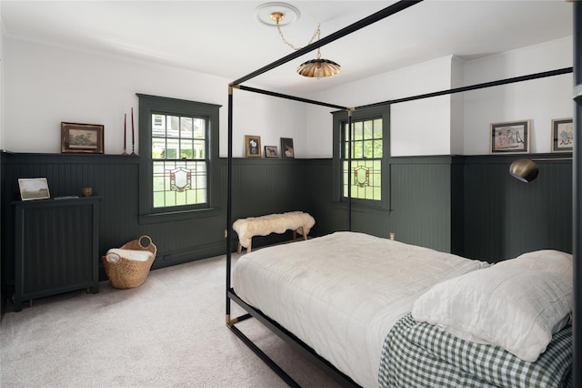 305 Park Hill Ave, Yonkers, NY 10705 - carpeted bedroom featuring wainscoting and radiator