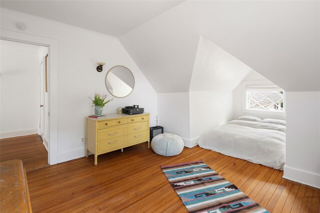 305 Park Hill Ave, Yonkers, NY 10705 - bedroom with light wood-type flooring and vaulted ceiling