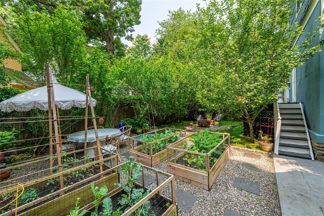305 Park Hill Ave, Yonkers, NY 10705 - view of yard featuring a vegetable garden and stairway