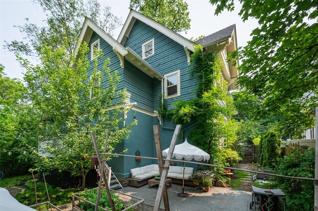 305 Park Hill Ave, Yonkers, NY 10705 - view of side of property with a patio area and outdoor lounge area
