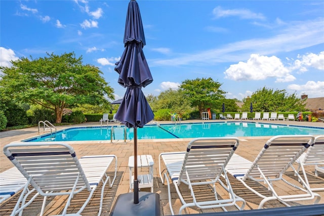 82 Harbour Ln, Bay Shore, NY 11706 - community pool with a patio