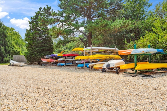 82 Harbour Ln, Bay Shore, NY 11706 - view of playground with view of wooded area