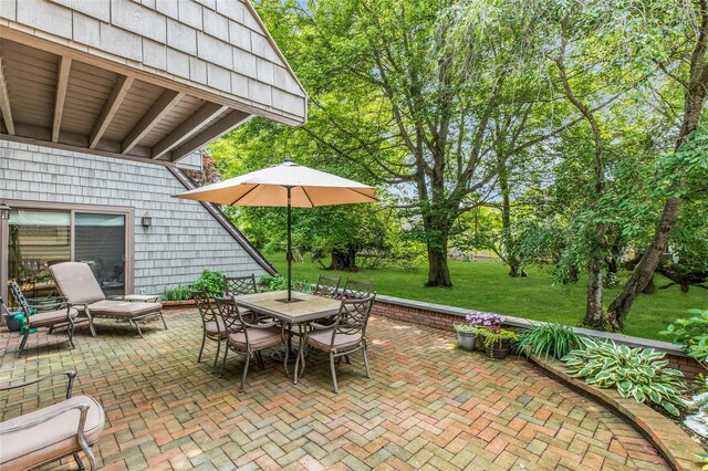 82 Harbour Ln, Bay Shore, NY 11706 - view of patio / terrace featuring outdoor dining space