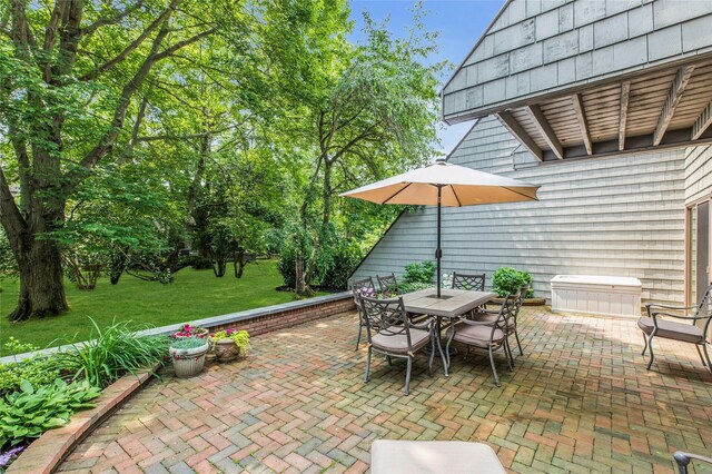 82 Harbour Ln, Bay Shore, NY 11706 - view of patio / terrace featuring outdoor dining space