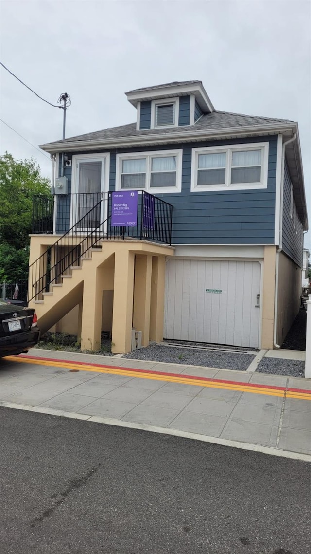 10 W 15th Rd, Broad Channel, NY 11693 - townhome / multi-family property featuring stairs