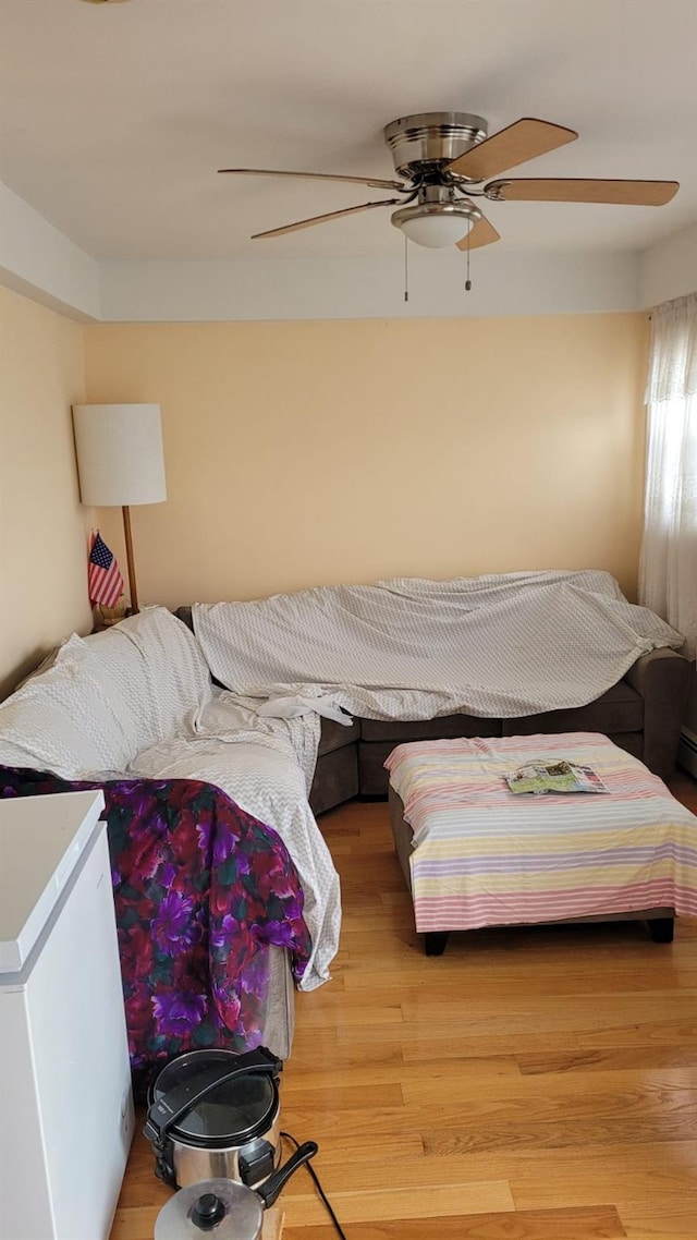 10 W 15th Rd, Broad Channel, NY 11693 - bedroom with light wood-type flooring and ceiling fan