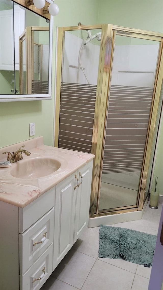 10 W 15th Rd, Broad Channel, NY 11693 - full bathroom with vanity, tile patterned floors, and a stall shower