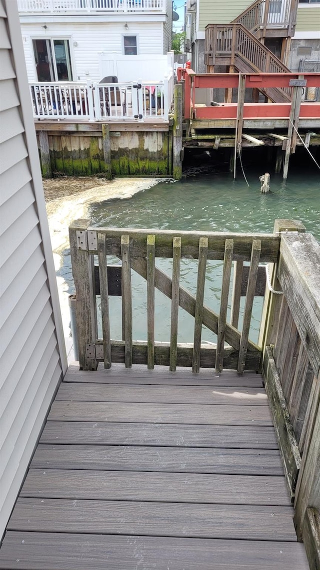 10 W 15th Rd, Broad Channel, NY 11693 - wooden deck with a water view