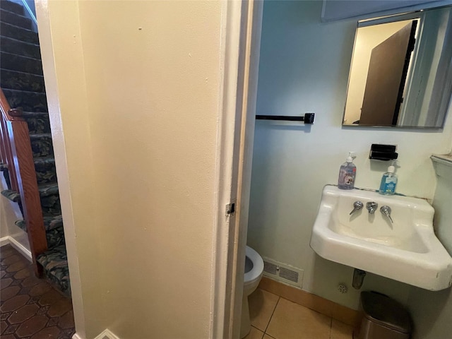 1037 E 214th St, Bronx, NY 10469 - bathroom featuring tile patterned flooring and toilet
