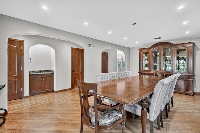 15 Dr Frank Rd, Spring Valley, NY 10977 - dining area featuring recessed lighting, light wood-style flooring, and arched walkways