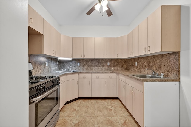 15 Dr Frank Rd, Spring Valley, NY 10977 - kitchen with stainless steel gas range oven, ceiling fan, tasteful backsplash, and light brown cabinetry