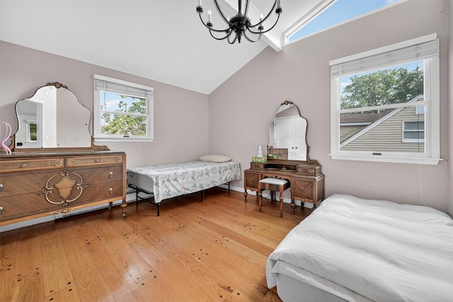 15 Dr Frank Rd, Spring Valley, NY 10977 - bedroom with a chandelier, vaulted ceiling, and wood-type flooring