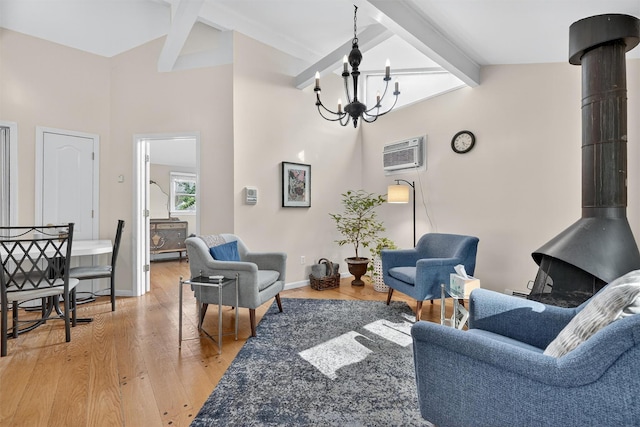 15 Dr Frank Rd, Spring Valley, NY 10977 - living area with a wood stove, beamed ceiling, a chandelier, light wood-style floors, and a wall unit AC