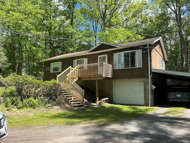 22 Bodine Lake Rd, Call Listing Agent, NY 12792 - view of front of house featuring an attached garage, dirt driveway, stairway, a carport, and view of wooded area