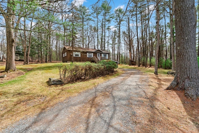 22 Bodine Lake Rd, Call Listing Agent, NY 12792 - view of side of home featuring driveway and a yard