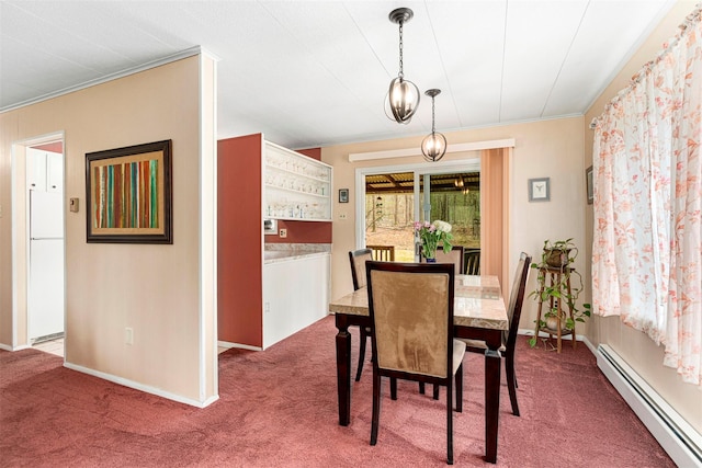 22 Bodine Lake Rd, Call Listing Agent, NY 12792 - dining area with a baseboard radiator, dark carpet, crown molding, and baseboards