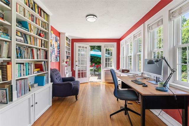 66 Riverview Rd, Irvington, NY 10533 - office area featuring plenty of natural light, a textured ceiling, and light wood-style floors