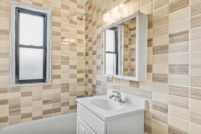 3505 Parsons Blvd Unit 5H, Flushing, NY 11354 - bathroom with tile walls, vanity, and shower / washtub combination