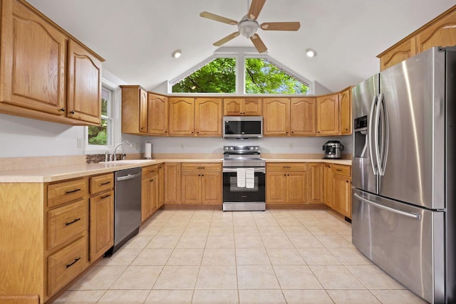 571 Farm To Market Rd, Brewster, NY 10509 - kitchen with stainless steel appliances, a sink, vaulted ceiling, ceiling fan, and light countertops