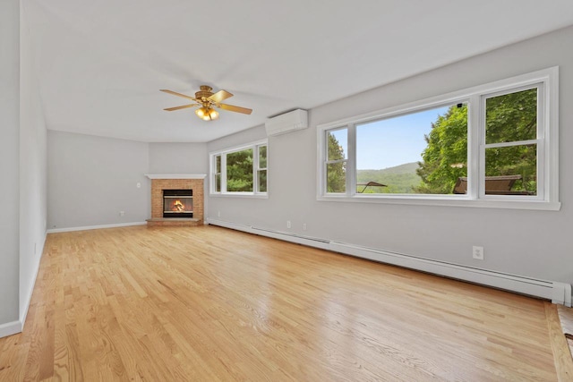 571 Farm To Market Rd, Brewster, NY 10509 - unfurnished living room with baseboard heating, a ceiling fan, light wood-type flooring, baseboards, and a fireplace