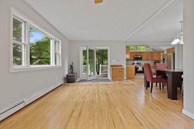 571 Farm To Market Rd, Brewster, NY 10509 - living area with a baseboard radiator and light wood-style flooring