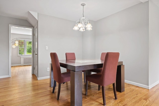 571 Farm To Market Rd, Brewster, NY 10509 - dining room with a chandelier, baseboards, light wood-style floors, and radiator