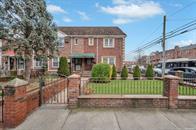 21-89 47th St, Long Island City, NY 11105 - view of front facade with a fenced front yard and a gate