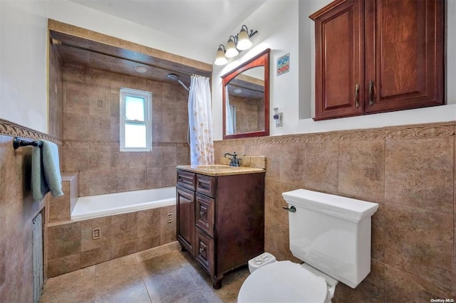 21-89 47th St, Long Island City, NY 11105 - bathroom featuring vanity, tile walls, toilet, and tiled shower / bath combo