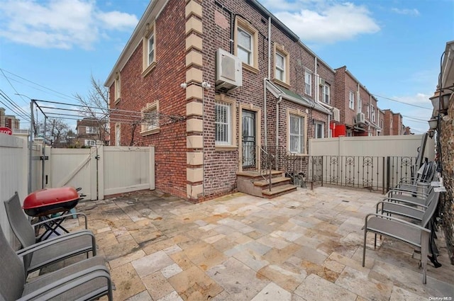 21-89 47th St, Long Island City, NY 11105 - fenced backyard featuring a gate and a patio