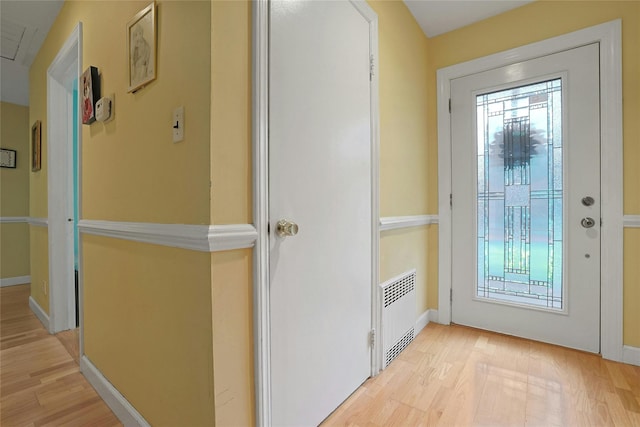 19 Leicester Rd, Briarcliff Manor, NY 10510 - entryway with radiator, light wood finished floors, healthy amount of natural light, and baseboards