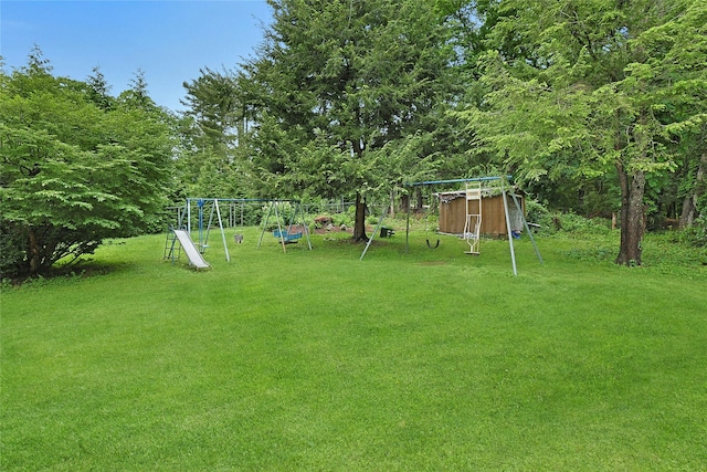 19 Leicester Rd, Briarcliff Manor, NY 10510 - view of green lawn featuring a playground
